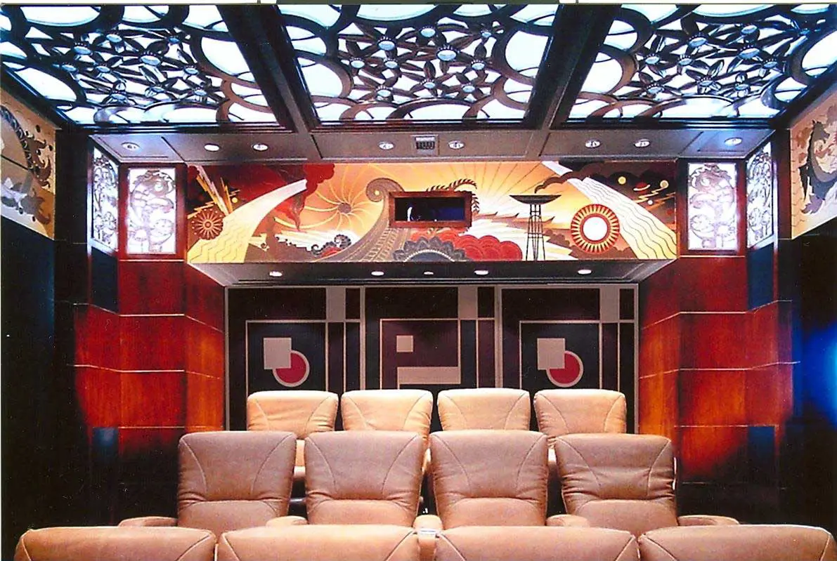 art being used above the wooden pillars of a movie room